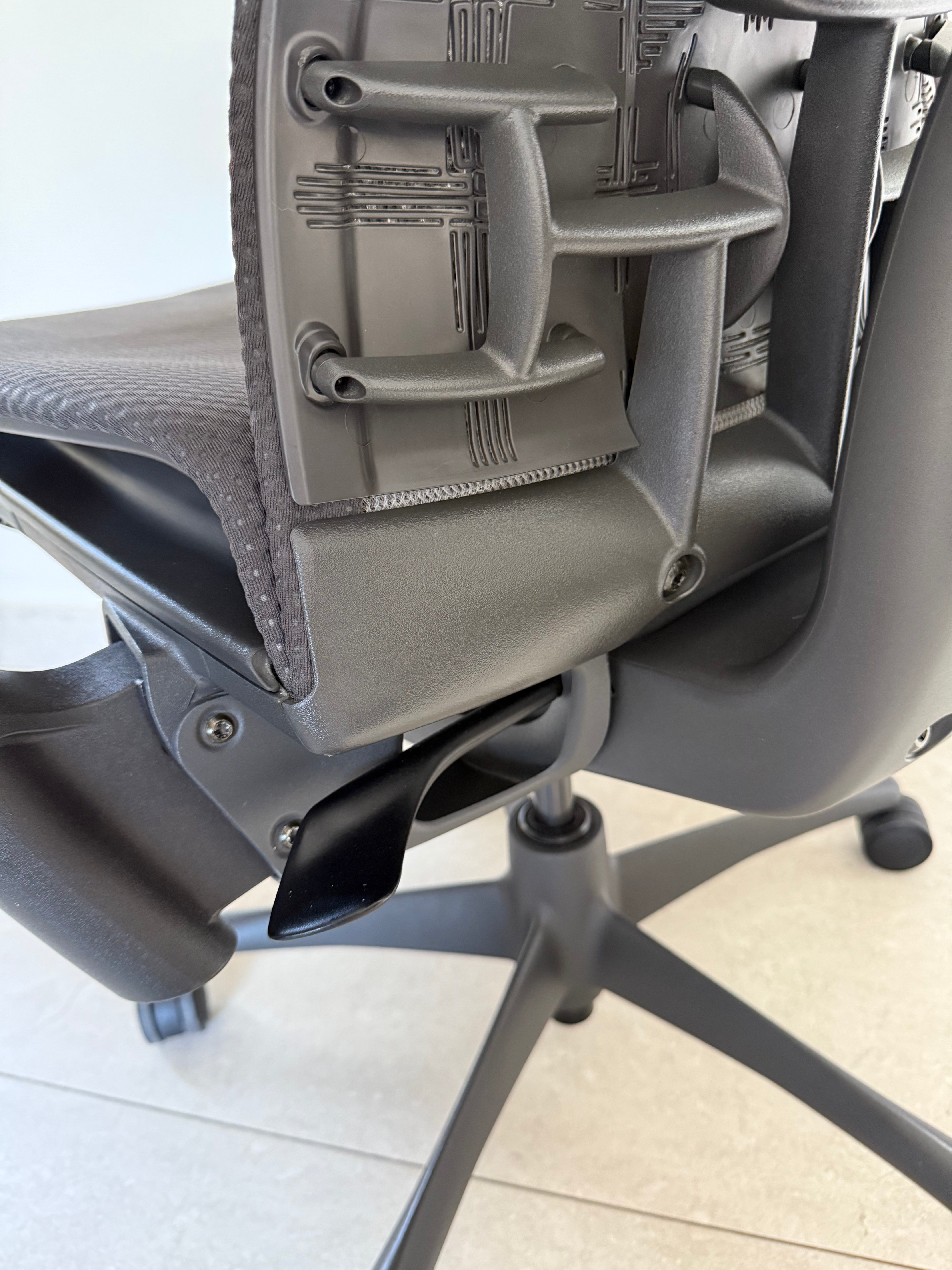 Vista de la base y ruedas de la silla